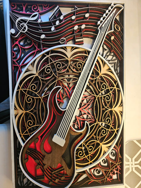 Layered wood art of electric guitar and music notes, custom fan art by BearNugget Customs