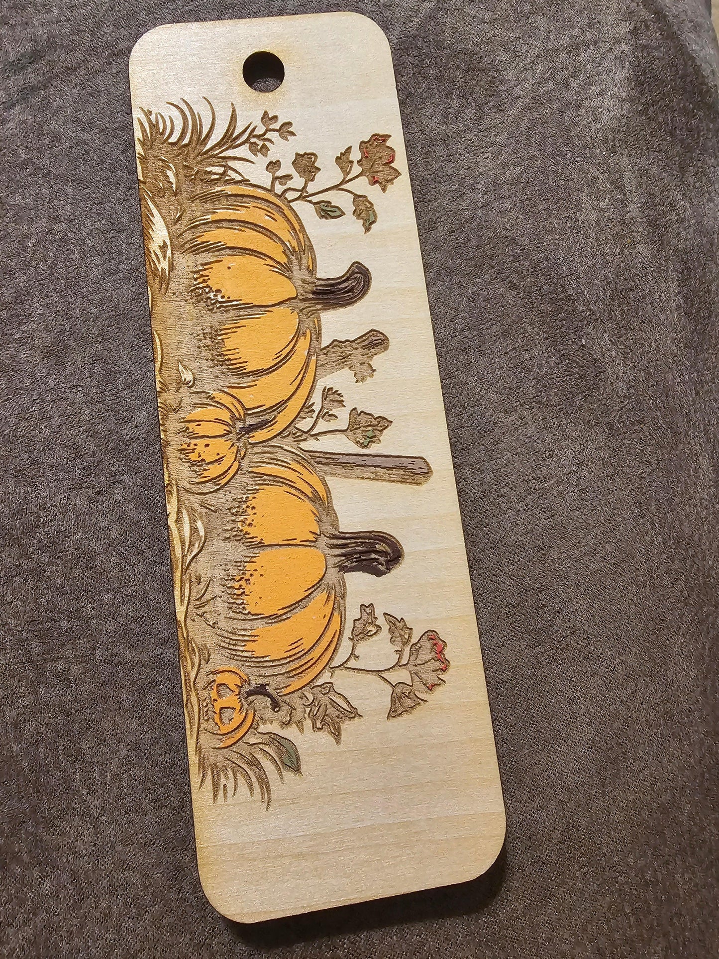 Custom wooden bookmark with hand-painted pumpkins and leaves by BearNugget Customs