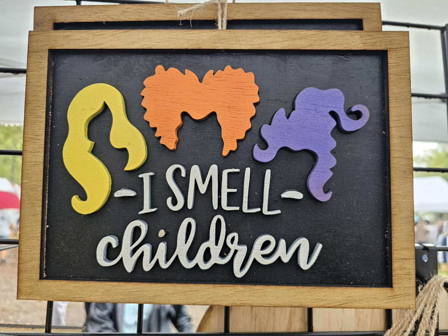 Bearnugget Customs handmade wooden sign with colorful hair silhouettes and 'I Smell Children' text.