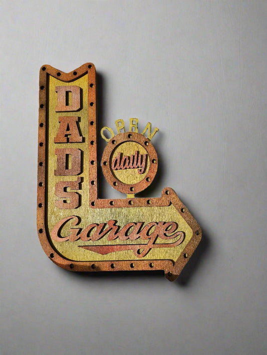 Custom wooden sign shaped like an arrow reading 'Dads Garage, Open Daily' from Bearnugget Customs.