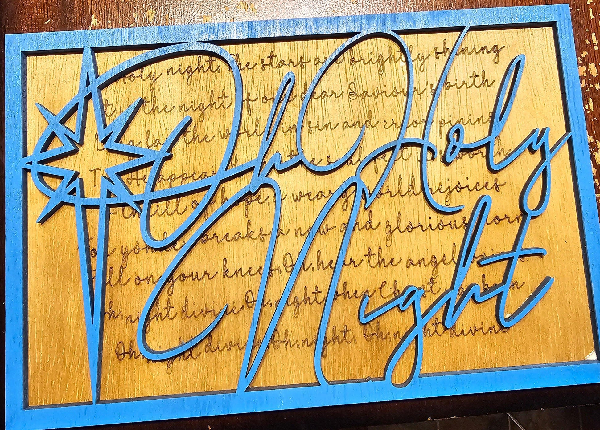 Custom wooden sign with blue 'Oh Holy Night' text, star design, and Christmas lyrics by Bearnugget Customs