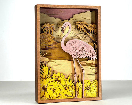 Layered wood art sign of a pink flamingo with tropical flowers and palm trees, Bearnugget Customs.